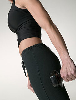 Build a Strong Core and Arms With the Suitcase Walk