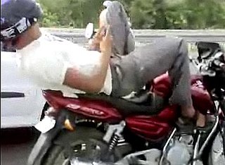 Texting Man on Motorcycle
