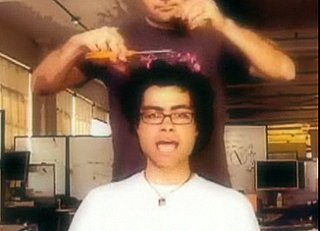 Man Lip Syncs "Be My Baby" While Getting Hair Cut