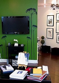 Photographer Lauren Hillary Uses Her Mounted Flat Screen TV To Complement Decor