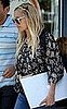 Nicole Richie Carries a Bare MacBook Pro To DUI Class
