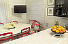 Tori Spelling Mounts Flat Screen TV in Her Dining Room
