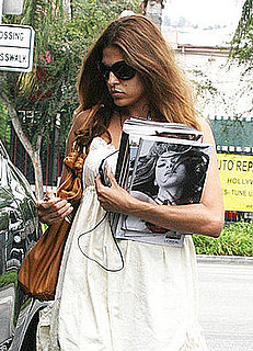 Eva Mendes Keeps Her Headphones in and Her Hands Free 