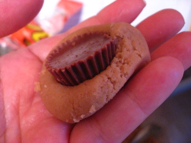 Adding the peanut butter cup. Adding the peanut butter cup.