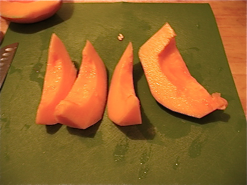 Slice each half of the cantaloupe into large wedges. You can serve them as is for more generous portions.
Slice each half of the cantaloupe into large wedges. You can serve them as is for more generous portions.