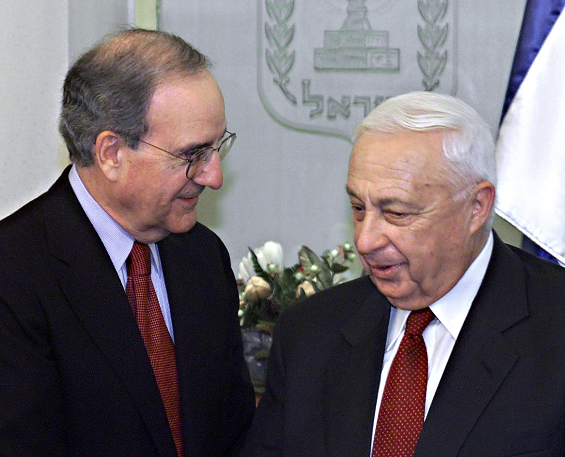 Mitchell speaks to former Israel PM Ariel Sharon, while serving as head of commission on Israel and Palestine in 2001. Mitchell speaks to former Israel PM Ariel Sharon, while serving as head of commission on Israel and Palestine in 2001.