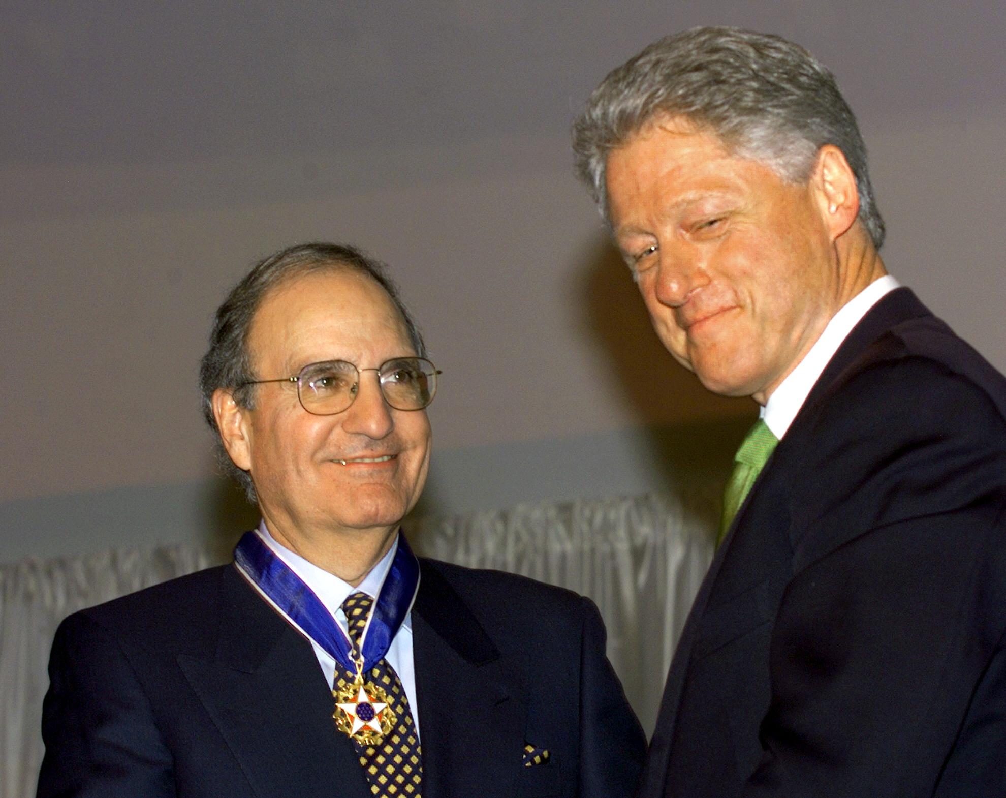 Mitchell receives the Presidential Medal of Freedom for his work to bring peace to Northern Ireland. Mitchell receives the Presidential Medal of Freedom for his work to bring peace to Northern Ireland.