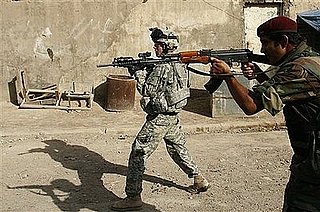 Officials: Clashes in Iraq's Sadr City kill 11