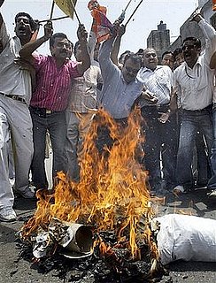 Consumers Protest Fuel Price Hike in India for Second Day