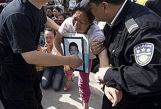 Chinese Police Drag Grieving Parents From Protest