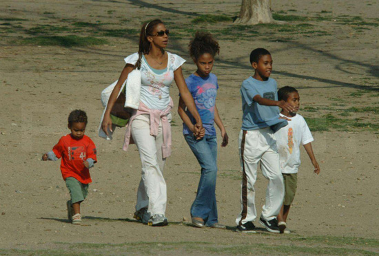 Holly Robinson Peete took her brood and pup to a dog park in LA. Holly Robinson Peete took her brood and pup to a dog park in LA.