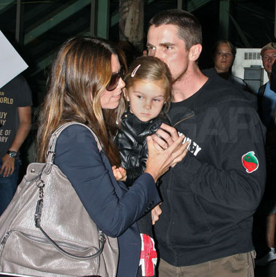 The Bale Family Gives Smooches at LAX The Bale Family Gives Smooches at LAX