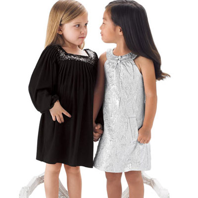 Sister Sam Puffed Sleeve Dress ($90) and Sister Sam Metallic Sheath Dress ($110) Sister Sam Puffed Sleeve Dress ($90) and Sister Sam Metallic Sheath Dress ($110)