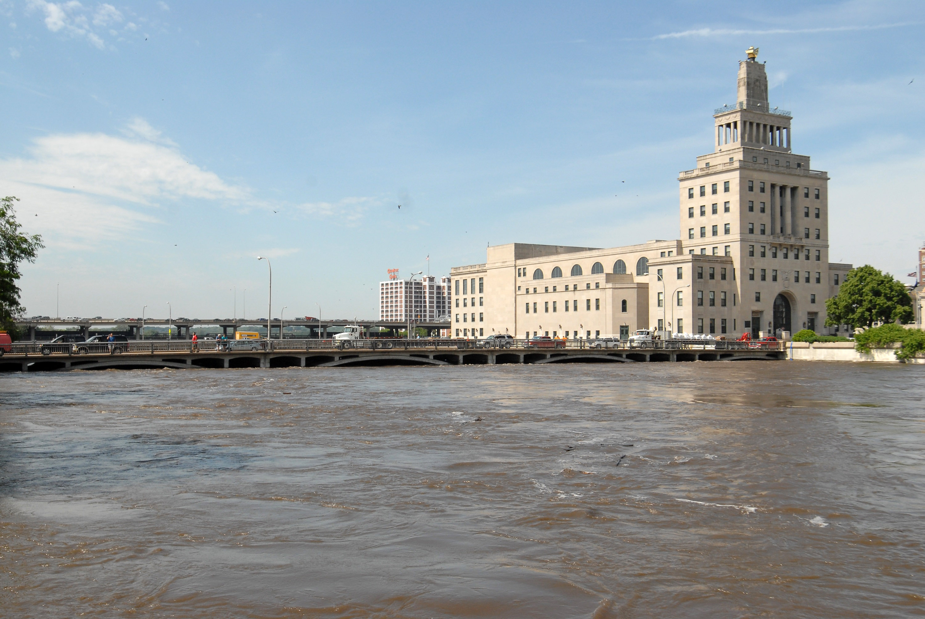 The Federal Building stands on an island next to the rising Cedar River. The Federal Building stands on an island next to the rising Cedar River.