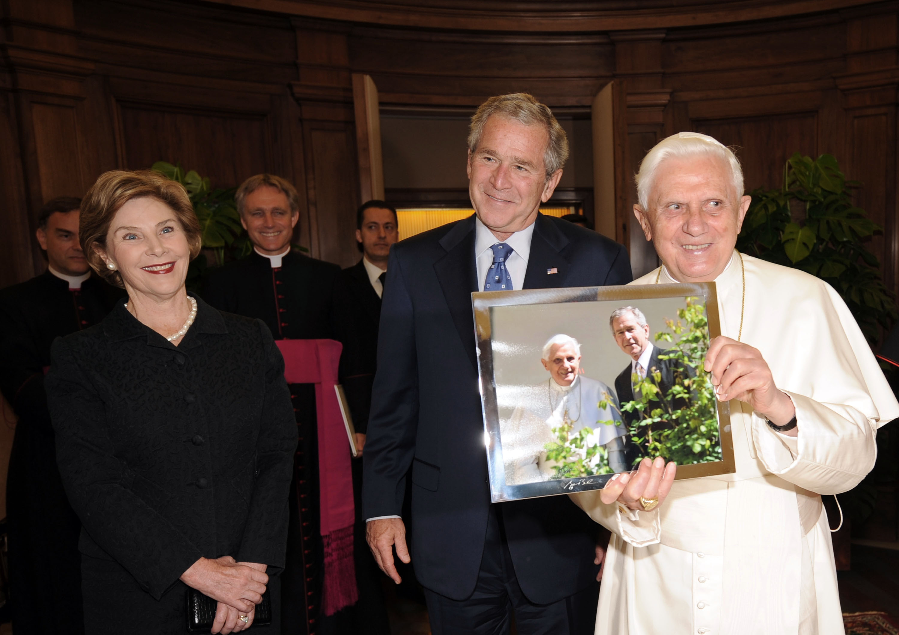 Pope Benedict XVI holds a picture while meeting with Bush and first lady Laura Bush June 13, 2008. Pope Benedict XVI holds a picture while meeting with Bush and first lady Laura Bush June 13, 2008.