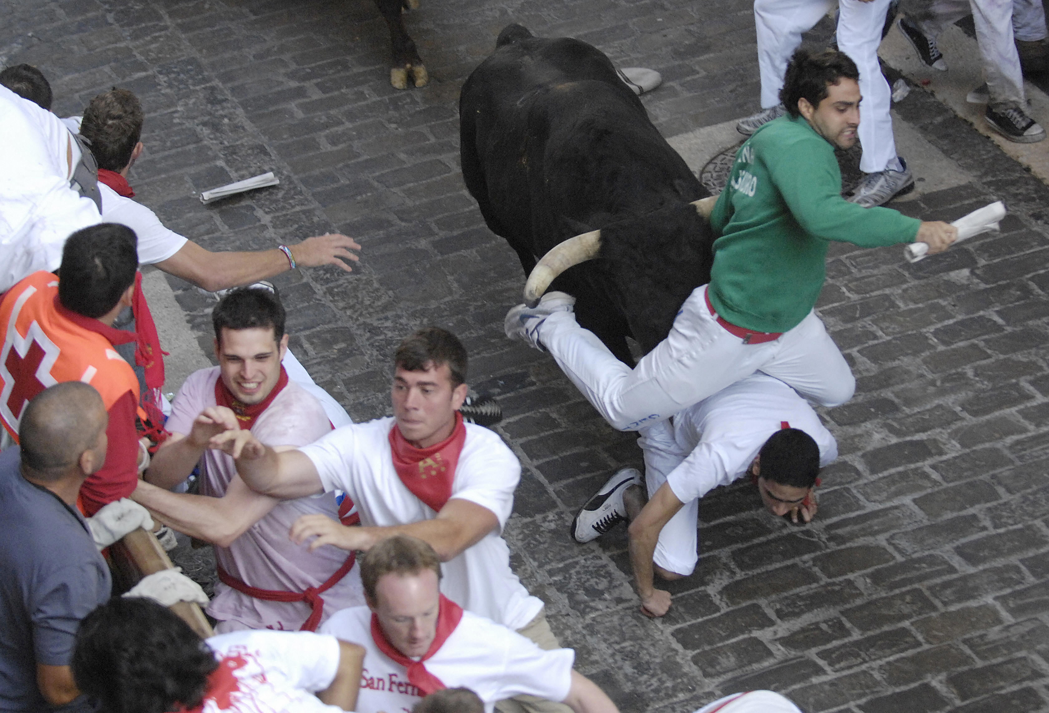 Hundreds of people are chased along an 825-meter course. Hundreds of people are chased along an 825-meter course.