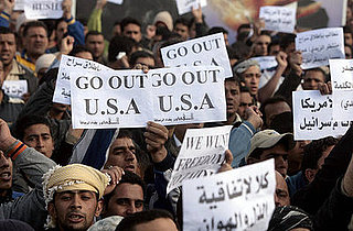 Front Page: Iraqis Demand Release of Bush Shoe Attacker 