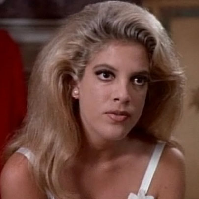 While in France, Donna wore her hair and makeup like French beauty Brigitte Bardot.
While in France, Donna wore her hair and makeup like French beauty Brigitte Bardot.