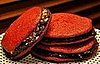 Red Velvet Cookies With Dark Chocolate Cream Cheese Frosting and Roasted Hazelnuts