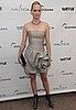 Amber Valletta Attends World Oceans Day in Silver Strapless Oscar de la Renta Origami Dress and Black Peep-toe Booties