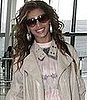 Photo of Beyonce Knowles Wearing Alexis Bittar Earrings at Heathrow Airport in London