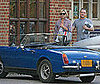 Photo of Kate Moss and Her Blue Convertible in the Cotswolds