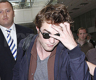 Photo Slide of Robert Pattinson Heading to Cannes from the Nice Airport