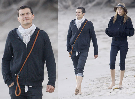 Orlando and Miranda Walk on the Cool Beach