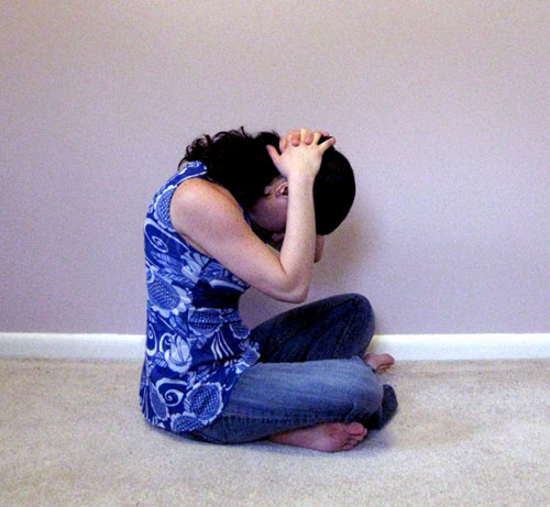 Stretch It: Seated Clasping Neck Stretch 
