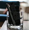 Geek Tip: Corral Remotes in a Clear Vase 
