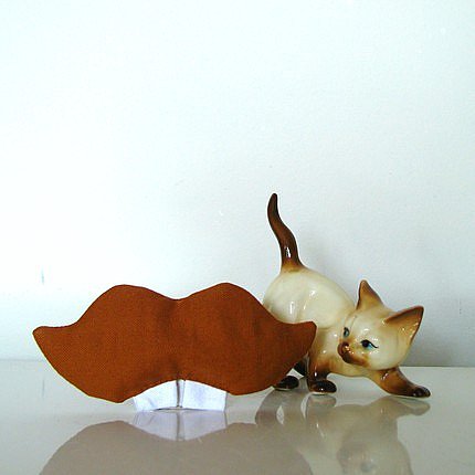 Buck Tooth Mustache Catnip Pillow ($10)