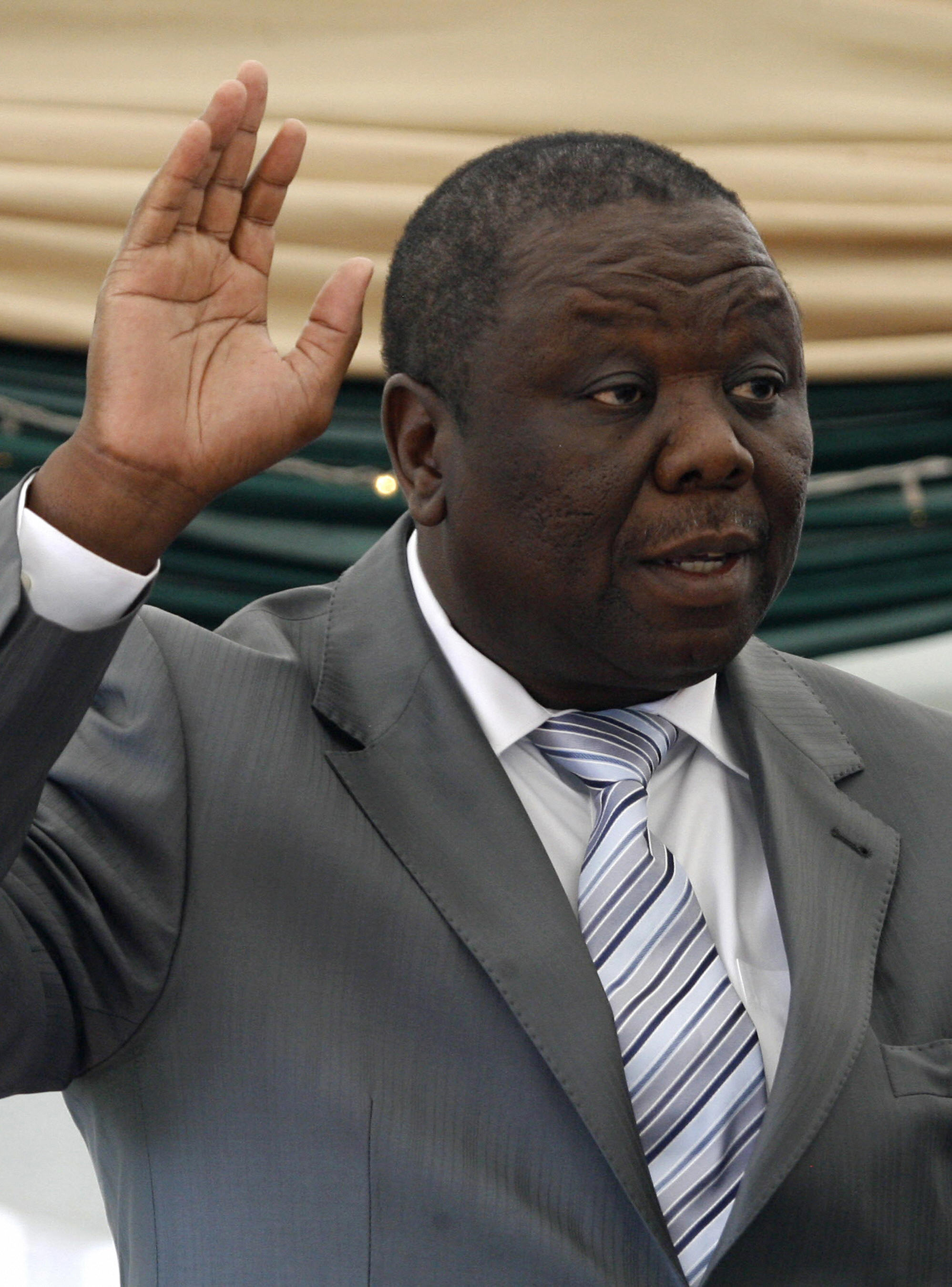 Opposition leader Morgan Tsvangirai is sworn in as prime minister. Opposition leader Morgan Tsvangirai is sworn in as prime minister.