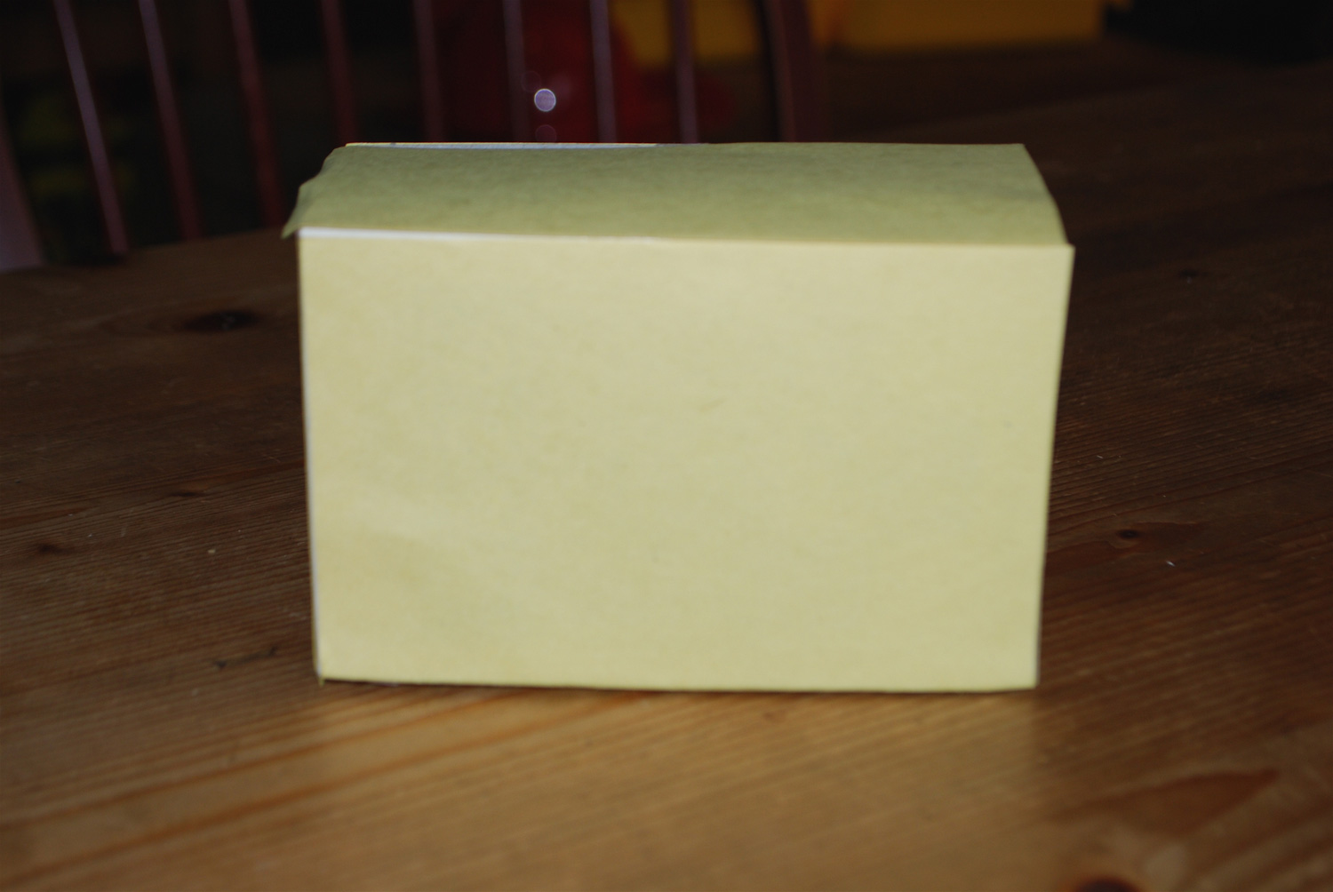 Cover box in yellow paper Cover box in yellow paper