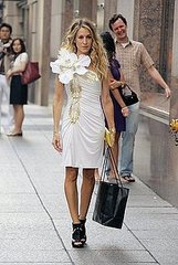 SATC Movie Sneak Peek! Carrie's Flower Power Dress: Love It or Hate It? SATC Movie Sneak Peek! Carrie's Flower Power Dress: Love It or Hate It?