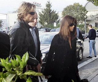 Halle Brings Gabriel As Carry-On Personal Item