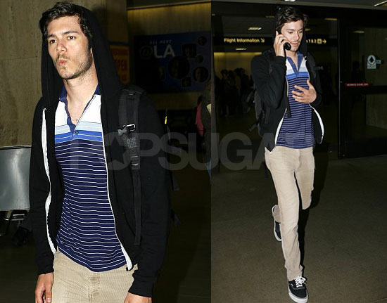 Adam Goes to LAX, Prob Not Whistling OC Theme Song