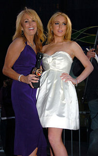 Dina Still Clinging to Lindsay's Fame