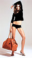 Super Sized Handbags and Back Pain