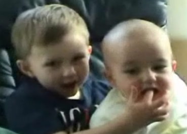 Baby Bites His Older Brother's Finger and Laughs